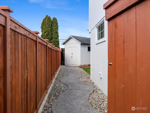 walkway from driveway to backyard and separate entrance