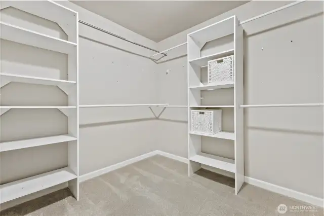 Large primary bedroom walk in closet.