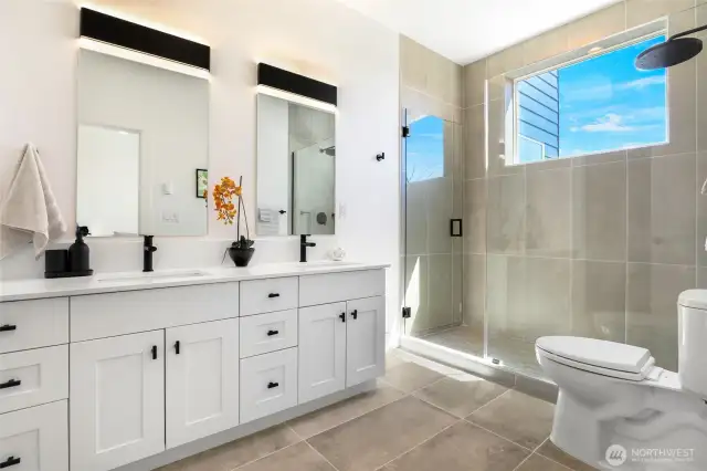 3rd full spa-like bathroom attached to primary bedroom.