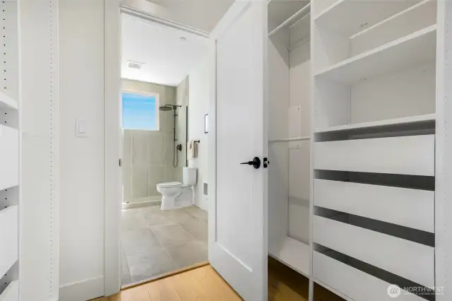 Walk-in closet off of primary bedroom.