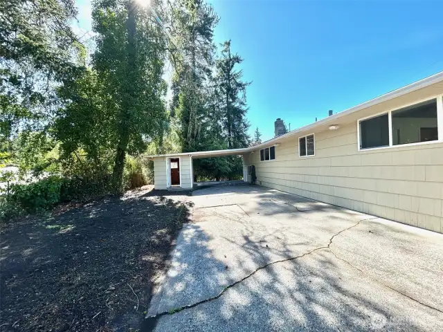 backyard of home including detached storage