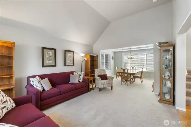 The formal living and dining rooms offer an elegant setting, perfect for entertaining guests. Enjoy the fresh feel of newer carpet and paint throughout.