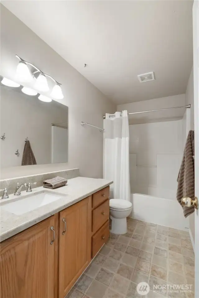 Full guest bathroom on upper level.