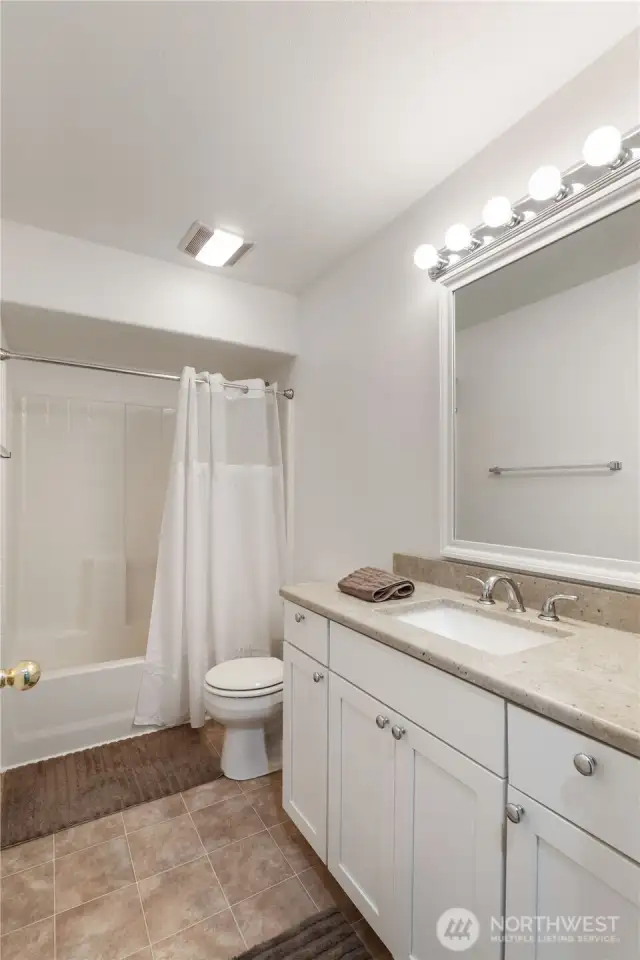 A full bathroom conveniently located in the fully finished basement.