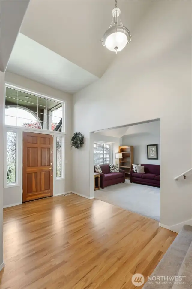 Gleaming hardwood floors and soaring ceilings welcome you into this magnificent home, setting the tone for elegance and comfort throughout.