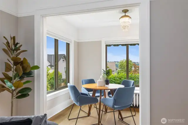 A roomy dining room with lake, territorial, lake and mountain views.
