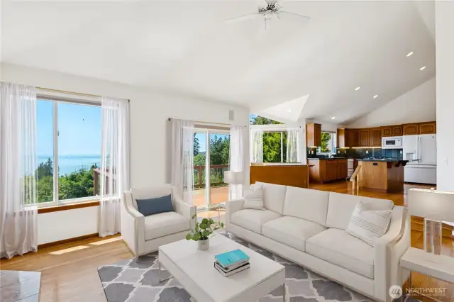 Sunken living room with gas fireplace.  Virtually staged.