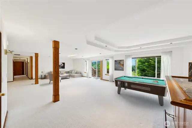 Large open basement space for gathering, entertaining, or multi-generational living.  Virtually staged.