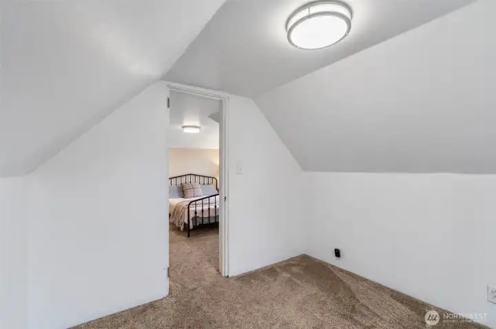 This is the extra finished room just off the primary bedroom. Wouldn't this be an amazing space for a nursery ... or perhaps a huge walk-in closet ... or even a bath?