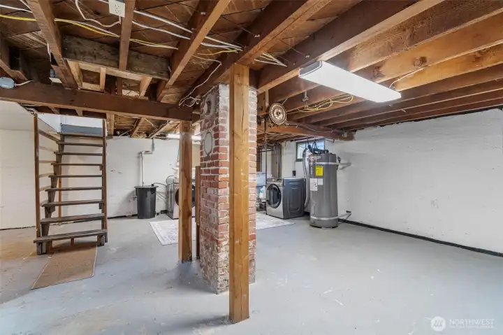 Going downstairs from the family room is the full basement. Definitely high enough ceilings for a rec room!