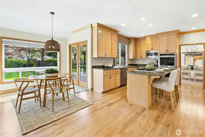 Lots of options for casual dining here, and of course more formal in the dining room. Seen here is the door to the back yard!!! Be ready! You will love it!