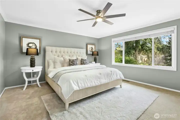 Upstairs, a luxuriously sized primary suite awaits you at day's end.