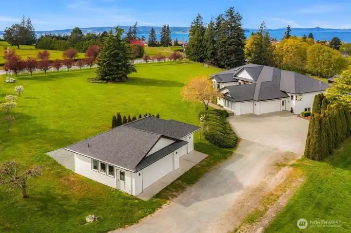 Detached 3 car garage/shop + attached 3 car agrage