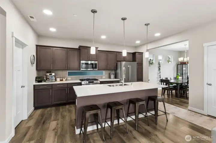 Kitchen has a walk in pantry.