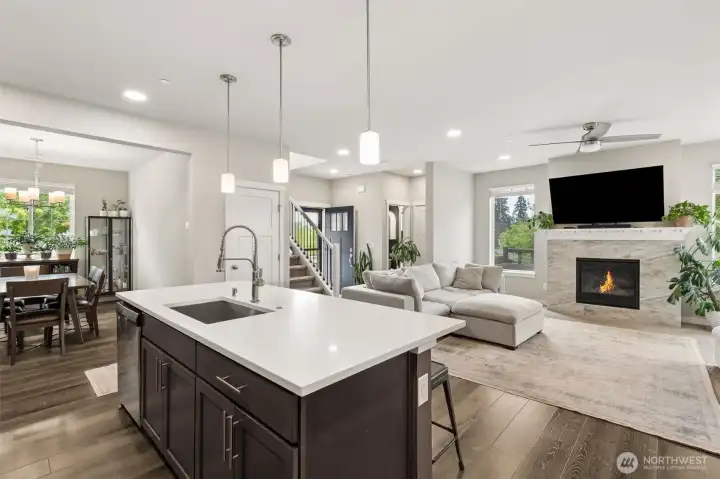 Large kitchen island with seating on side.
