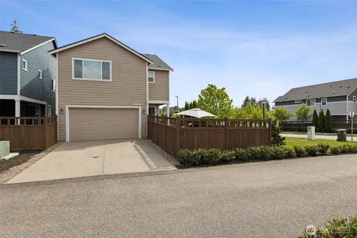 2-car attached garage and parking for 2 cars behind the garage.