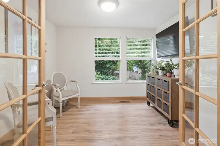 This is the main level bonus room that can be used as an office, spare space for guests, or gaming room.