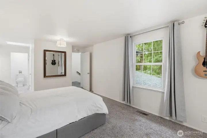Serene views of your forested property from every window.