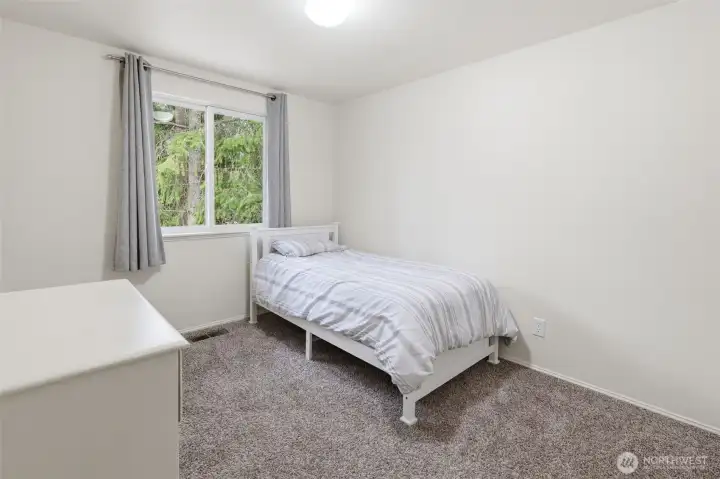 Guest bedroom 1 is nicely sized and easy to rearrange to style as you see fit.
