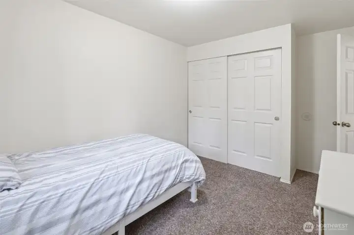 Both guest bedrooms are on the opposite side of the upstairs as the primary suite for a little extra privacy.