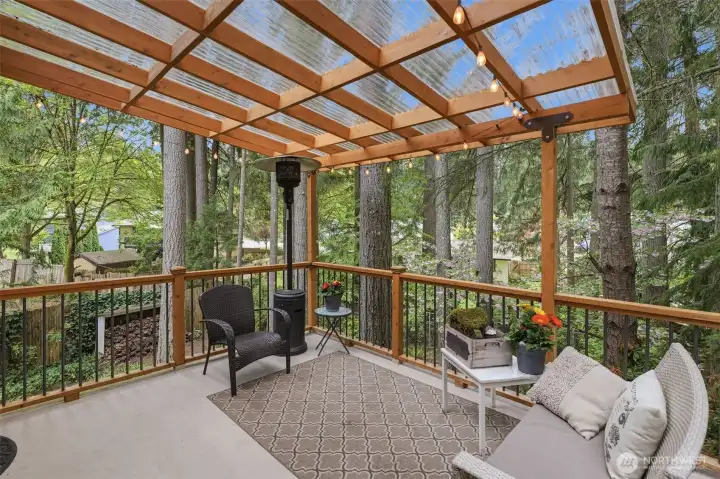 Newer deck with transparent awning allows for multi-season enjoyment.