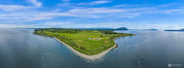 Panoramic aerial perspective showcasing the unique peninsula-like setting surrounded by water. Panoramic aerial perspective showcasing the unique peninsula-like setting surrounded by water.