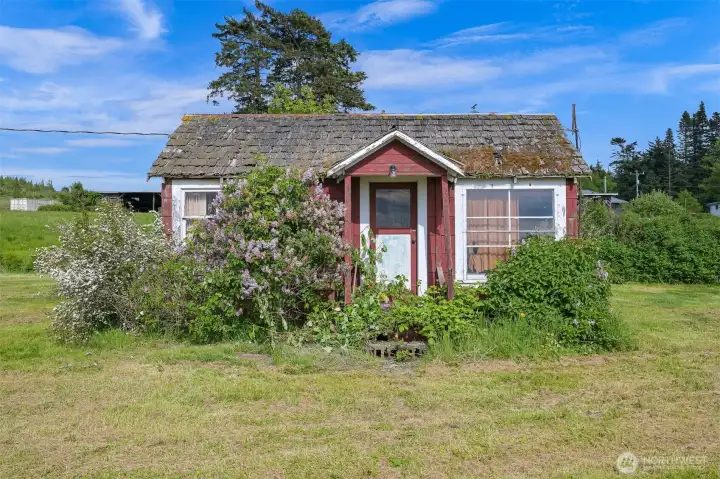 Charming rustic cabin adds character and reflects the property’s historic coastal setting. Charming rustic cabin adds character and reflects the property’s historic coastal setting.