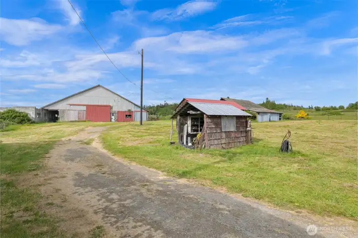 Substantial barn structure offers scale and flexibility for storage, agricultural operations, livestock, or future improvement potential. Substantial barn structure offers scale and flexibility for storage, agricultural operations, livestock, or future improvement potential.