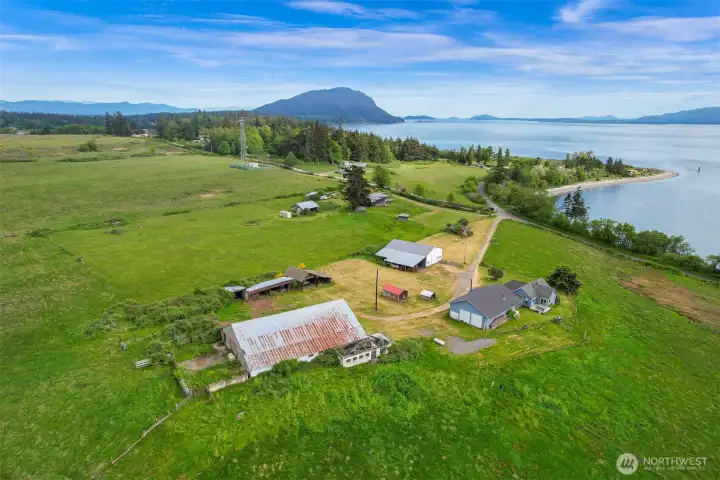 Detached outbuildings and open grounds provide flexibility for a variety of uses. Detached outbuildings and open grounds provide flexibility for a variety of uses.