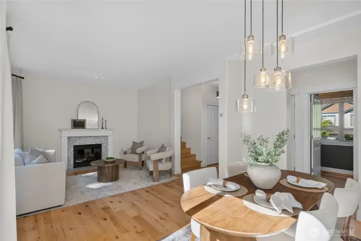 Another view of the living and dining area, with half bathroom across the way.