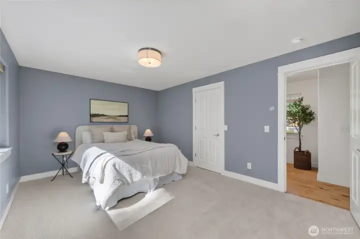 The primary suite features 2 closets with built in storage.