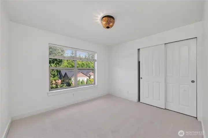 One of 3 additional upstairs rooms. This one overlooks the front of the home.
