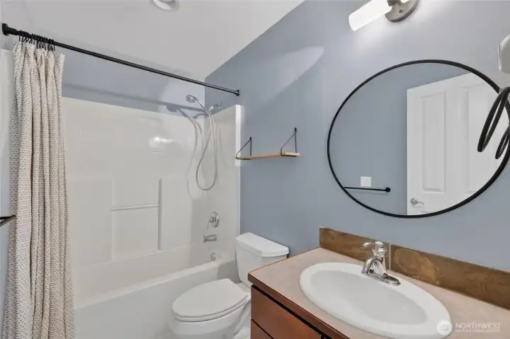 The upstairs full hallway bathroom.