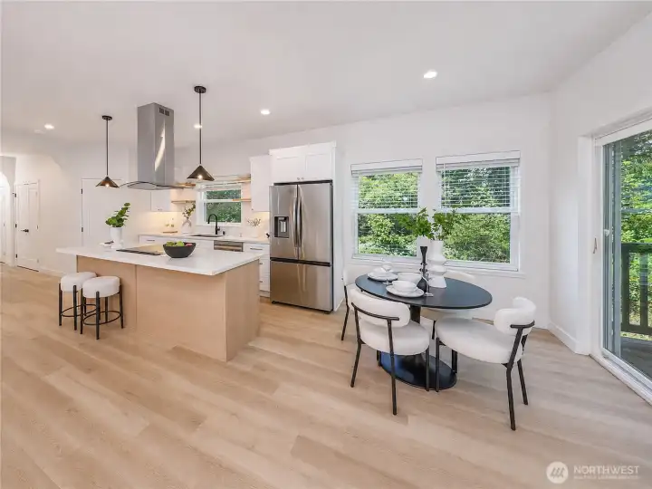 Spacious kitchen and breakfast nook. Spacious kitchen and breakfast nook.