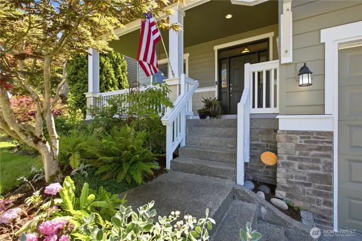 That gorgeous covered front porch emblematic of Craftsman Architecture! The ideal spot to curl up in a cozy chair with your favorite book! That gorgeous covered front porch emblematic of Craftsman Architecture! The ideal spot to curl up in a cozy chair with your favorite book!