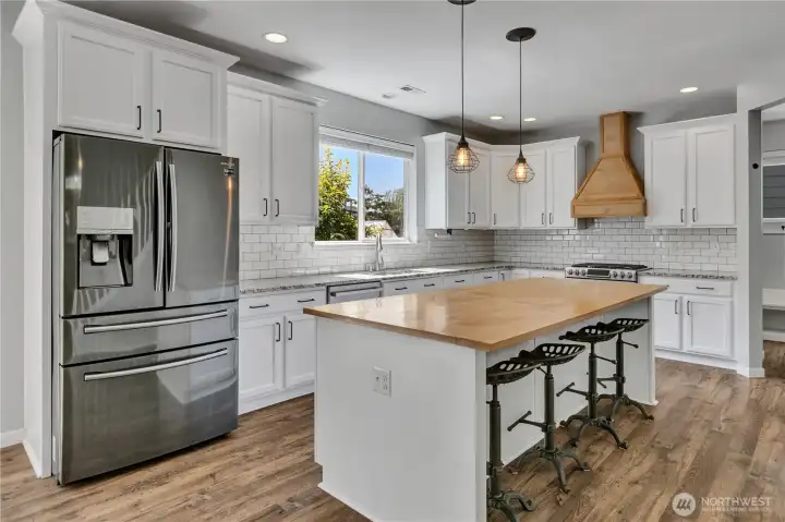 Open-concept kitchen that EVERYONE loves! Huge kitchen island - gather 'round & prepare holiday cookies! Open-concept kitchen that EVERYONE loves! Huge kitchen island - gather 'round & prepare holiday cookies!