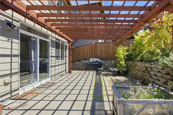 Easy access from kitchen to this large gazebo patio - ideal for those summer BBQ's! Easy access from kitchen to this large gazebo patio - ideal for those summer BBQ's!