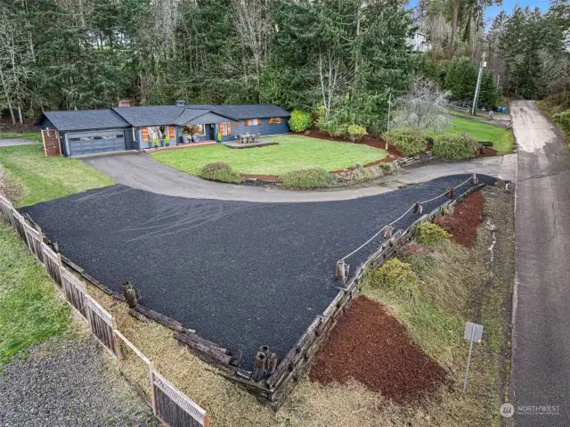 Freshly landscaped and new gravel provides plenty of parking for you and your guests.