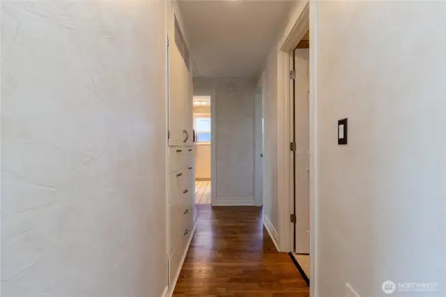 Hall leading to 3 main level bedrooms