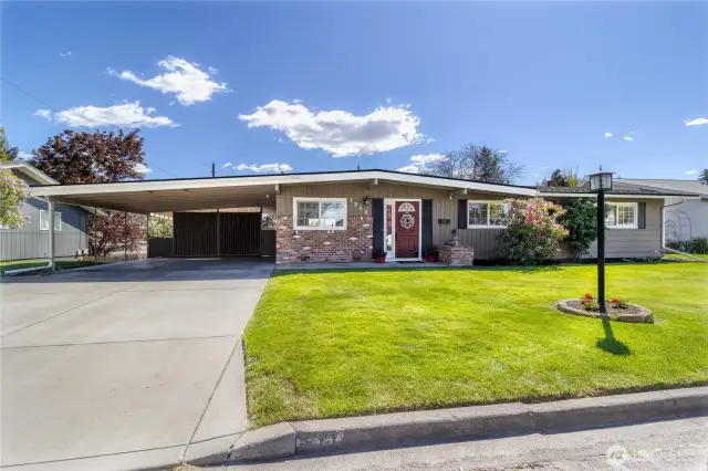 Ample off street parking, xtra-deep 2 place carport with keyless entry side door into dining/kitchen