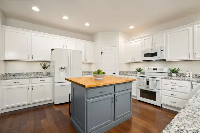 Ample pantry and counter space! The butcherblock counter has been epoxied for ease of use