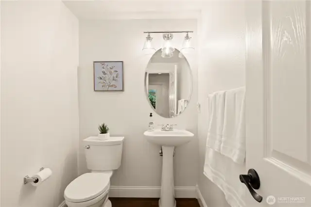 Downstairs powder room. Expand to the Left, and that's where the coat closet is. The plumbing is here to create a shower!