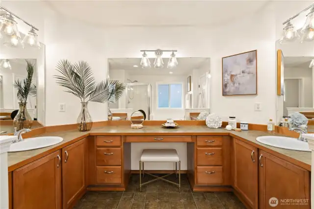 Huge double sink vanity plus seating area. Room for all of your things! There's also a separate linen closet AND huge walk-in closet