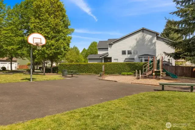 The Parke Meadows playground, sport court, and lawn