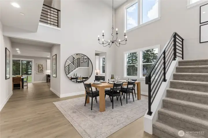 Enter into a 2-Story Dining with a wall of windows. Photos are for representational purposes only.  Colors and options may vary.