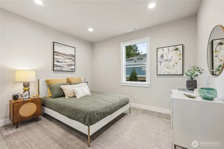 Main Floor Guest Bedroom. Photos are for representational purposes only.  Colors and options may vary.