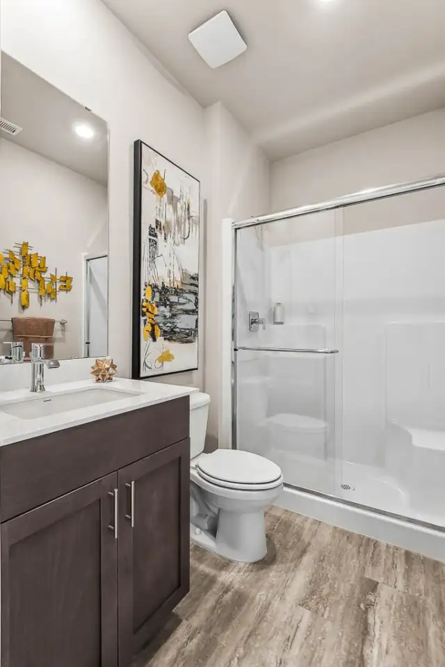 Main floor Bathroom with Shower. Photos are for representational purposes only.  Colors and options may vary.