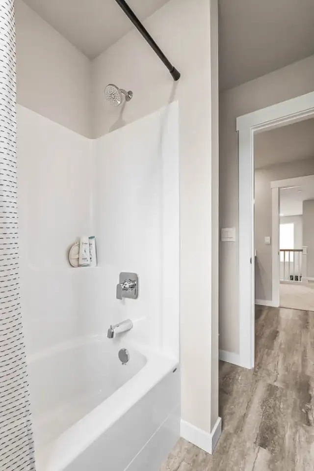 Upstairs Bathroom has separate room for bathing. Photos are for representational purposes only.  Colors and options may vary.