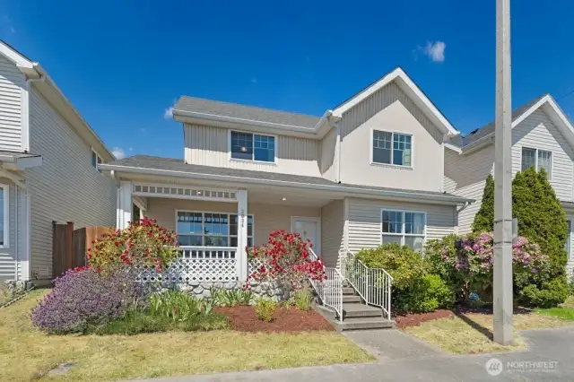 Welcome! Great curb appeal with a covered porch, make it the perfect place to greet guests or relax with your morning coffee.