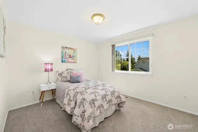 The third upper-level bedroom.